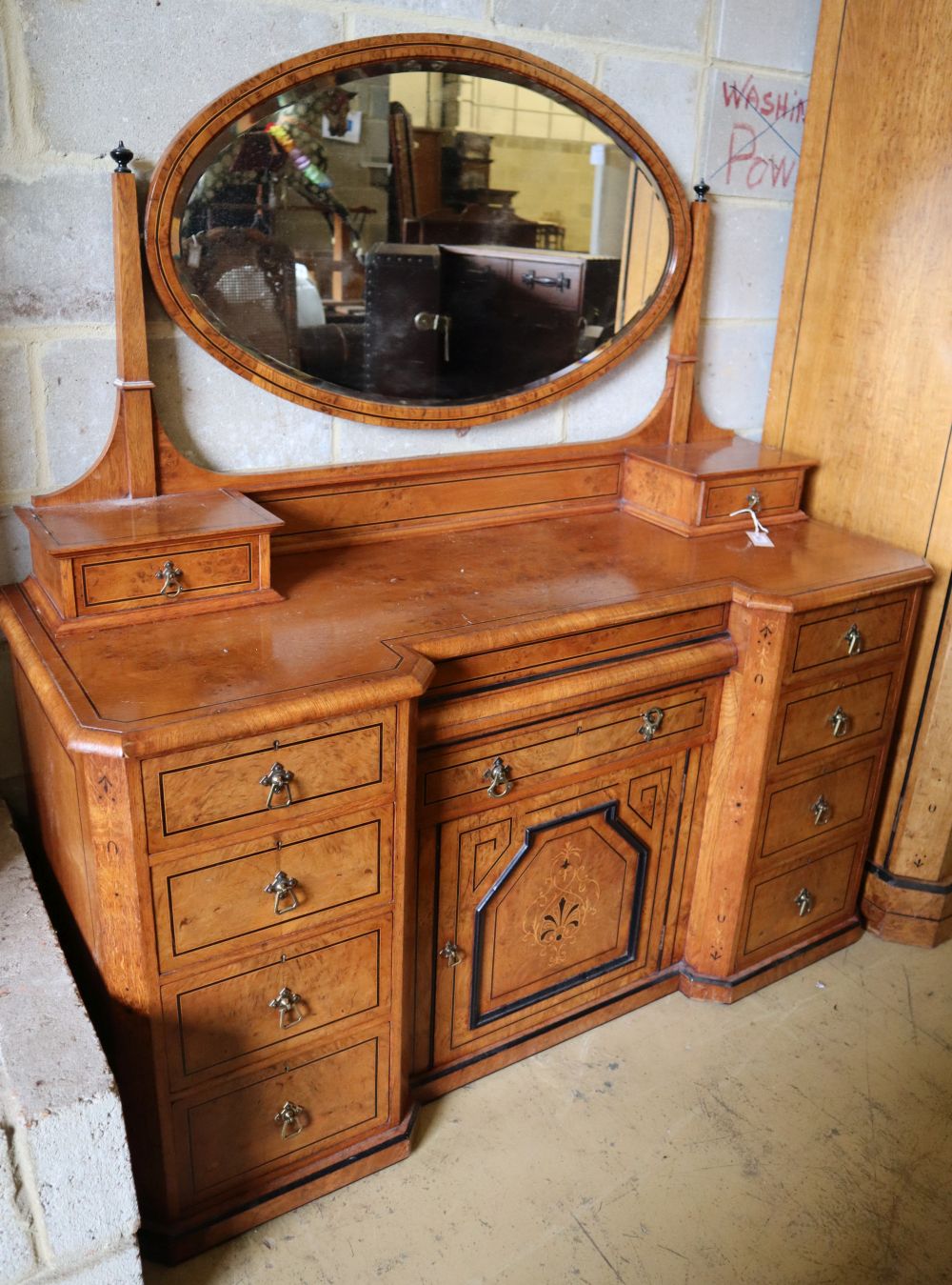 A late Victorian inlaid burr and pollard oak inverse breakfront dressing chest, width 146cm depth 56cm height 178cm